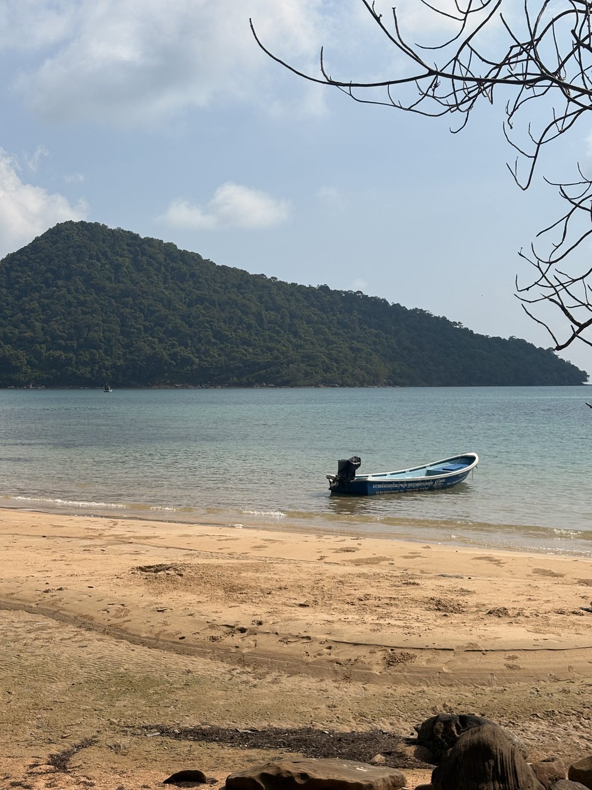 A small boat beside the beach on Koh Rong Sanloem