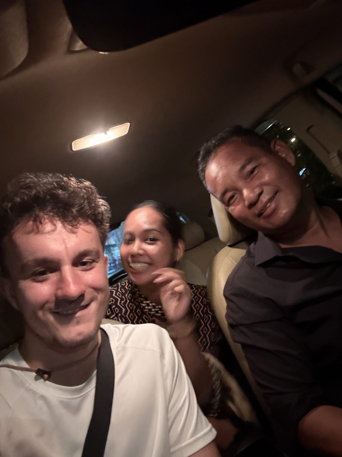 Ollie with local friends he met in Cambodia